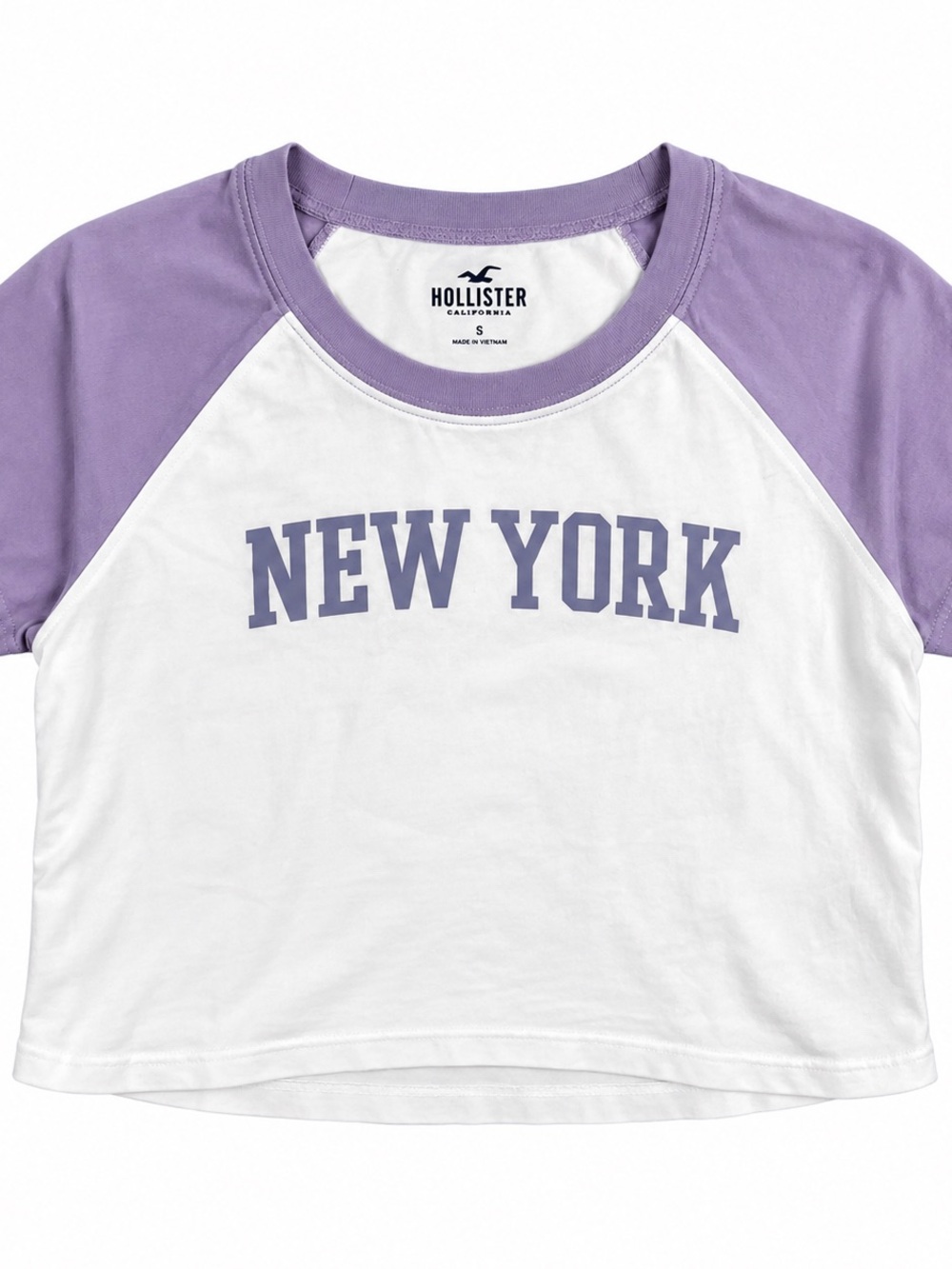 Hollister White Tee with Lavender Raglan Sleeves and 'New York' Graphic
